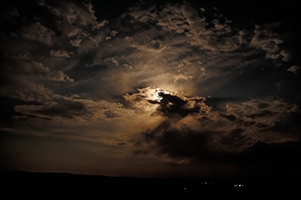 Bronze Clouds, Village Lights and the Moon